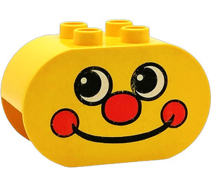 Duplo Yellow Brick 2 x 4 x 2 with Rounded Ends with Face with Red Nose and Dimples (6448)