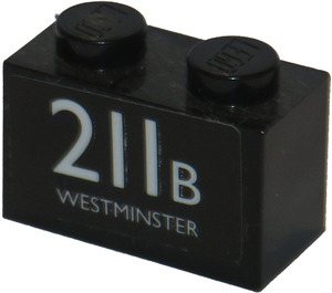 LEGO Black Brick 1 x 2 with 211B Westminster Sticker with Bottom Tube (3004)