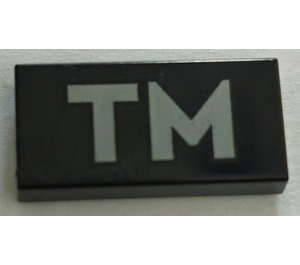 LEGO Black Tile 1 x 2 with "TM" logo with Groove (3069)