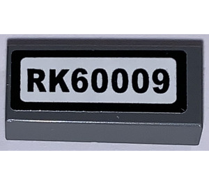 LEGO Dark Stone Gray Tile 1 x 2 with "RK60009" number plate Sticker with Groove (3069)