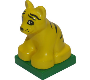 LEGO Duplo Yellow Tiger Cub sitting on green base