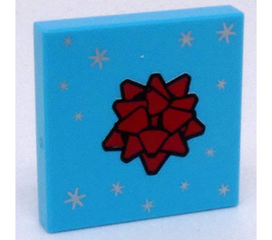 LEGO Medium Azure Tile 2 x 2 with Red Gift Bow and Silver Stars with Groove (3068)