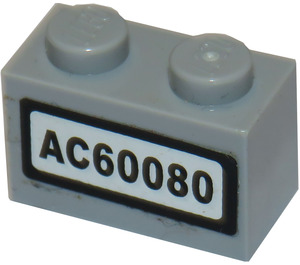 LEGO Medium Stengrå Kloss 1 x 2 med 'AC60080' Nummerskylt Klistermärke med bottenrör (3004)