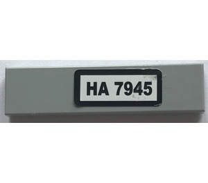 LEGO Medium Stone Gray Tile 1 x 4 with "HA 7945" Sticker (2431)