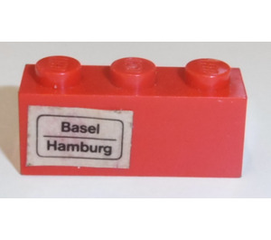 LEGO rouge Brique 1 x 3 avec 'Basel', 'Hamburg' (La gauche) Autocollant (3622)