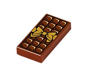 LEGO Roodachtig Bruin Tegel 1 x 2 met Chocolate Staaf en Gold Bow met groef (3069 / 25395)