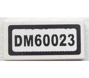 LEGO Tile 1 x 2 with 'DM60023' Sticker with Groove (3069)