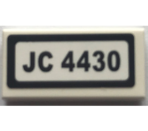 LEGO Tile 1 x 2 with "JC 4430" Sticker with Groove (3069)