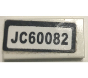 LEGO Weiß Fliese 1 x 2 mit "JC60082" Aufkleber mit Nut (3069)