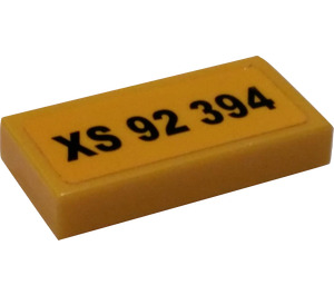 LEGO Yellow Tile 1 x 2 with XS 92 394 License Plate Sticker with Groove (3069)