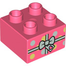 Duplo Brick 2 x 2 with Spotty present with Bow (3437 / 66011)