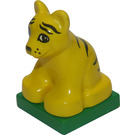 Duplo Yellow Tiger Cub sitting on green base (75014)