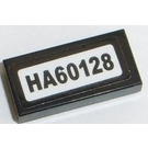 LEGO Black Tile 1 x 2 with Black "HA60128" Sticker with Groove (3069)