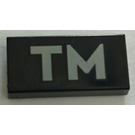 LEGO Black Tile 1 x 2 with "TM" logo with Groove (3069)