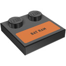 LEGO Black Tile 2 x 2 with Studs on Edge with ‘BAT RAM’ on Orange Background Sticker