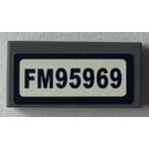 LEGO Dark Stone Gray Tile 1 x 2 with 'FM95969' Number Plate Sticker with Groove (3069)