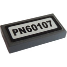 LEGO Dark Stone Gray Tile 1 x 2 with 'PN60107' Sticker with Groove (3069)