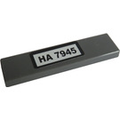 LEGO Dark Stone Gray Tile 1 x 4 with "HA 7945" Sticker (2431)