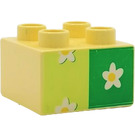 LEGO Light Yellow Duplo Brick 2 x 2 with white flower on green (3437 / 31460)