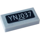 LEGO Medium Stone Gray Tile 1 x 2 with License Plate, 'YNJ037' Sticker with Groove (3069)