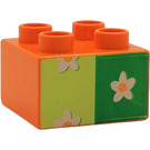 LEGO Orange Duplo Brick 2 x 2 with white flower on green (3437 / 31460)