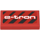 LEGO Red Tile 1 x 2 with ‘e-tron’ and Diagonal Black Stripes Sticker with Groove (3069)
