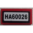 LEGO Red Tile 1 x 2 with 'HA60026' Sticker with Groove (3069)