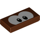 LEGO Reddish Brown Tile 1 x 2 with Stingby Eyes with Groove (3069 / 94924)