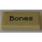 LEGO Tan Tile 1 x 2 with "Bones" Sticker with Groove (3069)