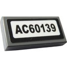 LEGO Tile 1 x 2 with "AC60139" Sticker with Groove (3069)