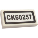 LEGO White Tile 1 x 2 with 'CK60257' Sticker with Groove (3069)