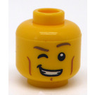 LEGO Yellow Head with Dark Tan Eyebrows, Cheek Lines, Smile and Right Eye Winking (Recessed Solid Stud) (3626)