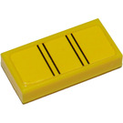 LEGO Yellow Tile 1 x 2 with Black Lines Sticker with Groove (3069)