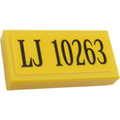 LEGO Yellow Tile 1 x 2 with 'LJ 10263' Sticker with Groove (3069)
