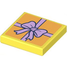 LEGO Yellow Tile 2 x 2 with Lavender Gift Bow Sticker with Groove (3068)
