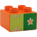 Duplo Orange Brick 2 x 2 with white flower on green (3437 / 31460)