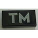 LEGO Schwarz Fliese 1 x 2 mit &quot;TM&quot; Logo mit Nut (3069)