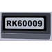 LEGO Dark Stone Gray Tile 1 x 2 with &quot;RK60009&quot; number plate Sticker with Groove (3069)