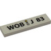 LEGO White Tile 1 x 3 with &#039;WOB - J 83&#039; Sticker (63864)