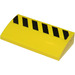 LEGO Yellow Slope 2 x 4 Curved with Black and Yellow Danger Stripes (Left) Sticker with Bottom Tubes (88930)