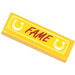 LEGO Yellow Tile 1 x 3 with &#039;FAME&#039;, Horseshoes Sticker (63864)