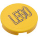LEGO Yellow Tile 2 x 2 Round with &quot;Lego&quot; Logo Sticker with Bottom Stud Holder (14769)