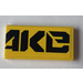 LEGO Yellow Tile 2 x 4 with black &#039;AKe&#039; (QUAKe right half) Sticker (87079)