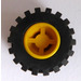 LEGO Yellow Wheel Rim Wide Ø11 x 12 with Notched Hole with Tire 21mm D. x 12mm - Offset Tread Small Wide with Bevelled Tread Edge