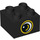 Duplo Black Brick 2 x 2 with Eye Facing Left, White Pupil and Gold Outline Pattern (3437 / 29753)