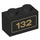 LEGO Black Brick 1 x 2 with Gold &#039;132&#039; Pattern with Bottom Tube (3004 / 19018)