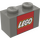 LEGO Donkergrijs Steen 1 x 2 met LEGO logo met buis aan de onderzijde (42481 / 50831)