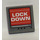 LEGO Dark Stone Gray Tile 2 x 2 with &#039;LOCK DOWN&#039; Sticker with Groove (3068)