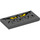 LEGO Dark Stone Gray Tile 2 x 4 with Grumpy Rock Face with Yellow Eyes (30729 / 87079)