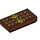 LEGO Reddish Brown Tile 1 x 2 with Chocolate Bar and Gold Bow with Groove (3069 / 25395)